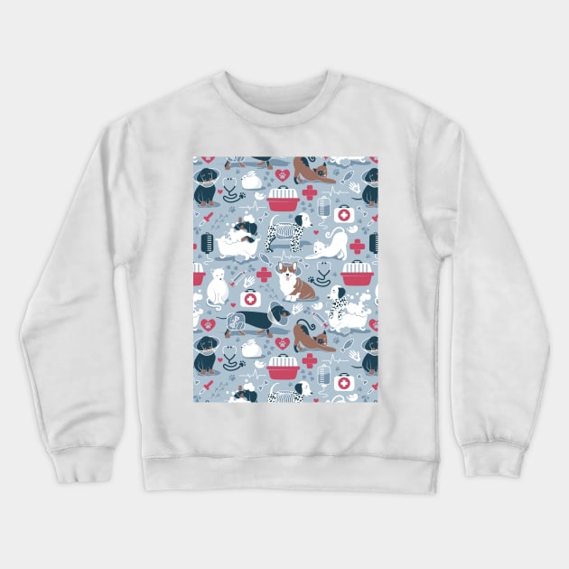 Veterinary medicine, happy and healthy friends // pattern // pastel blue background red details navy blue white and brown cats dogs and other animals Crewneck Sweatshirt by SelmaCardoso